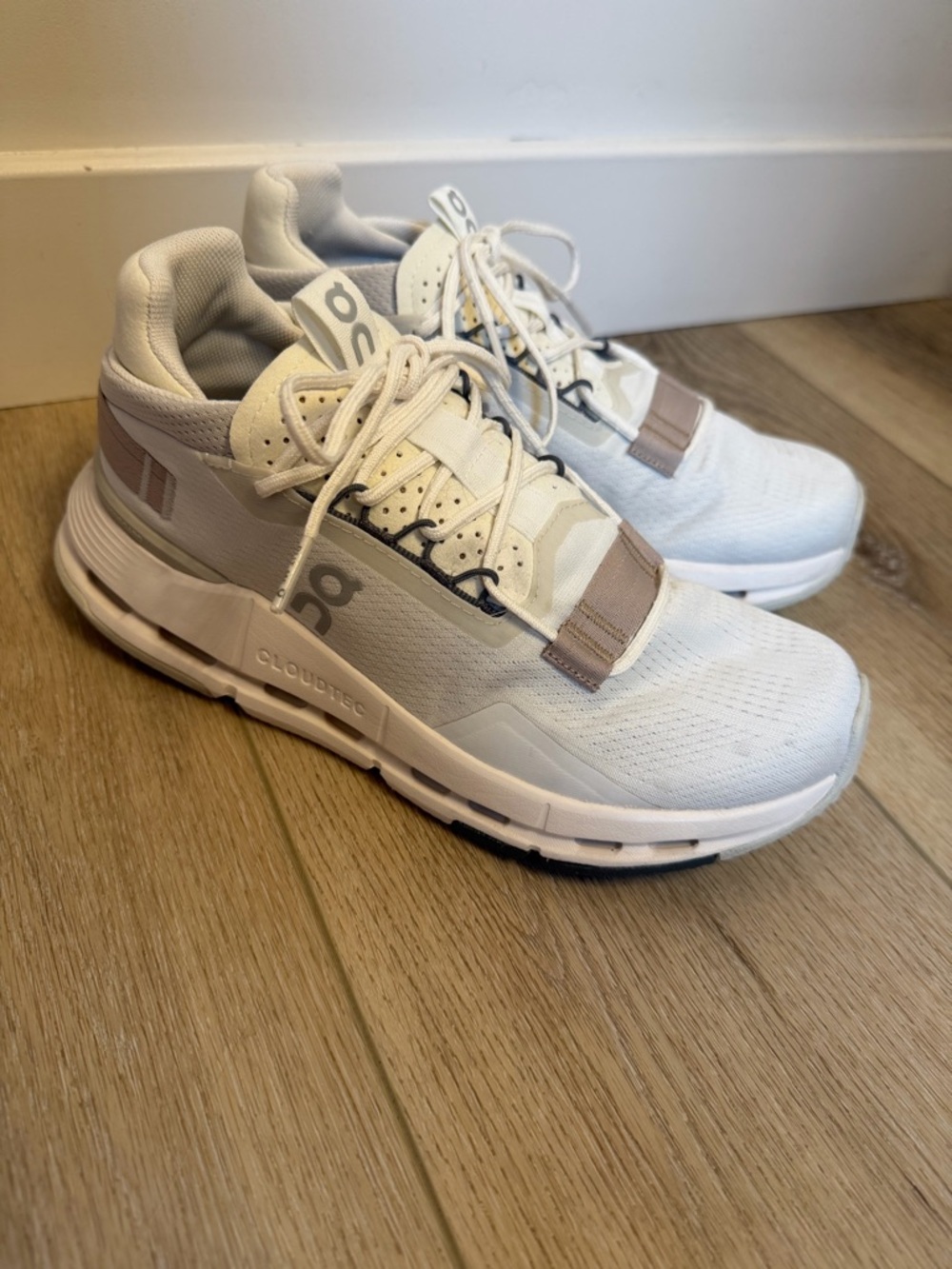 On Cloudnova Women’s Athletic Shoes in White with Taupe Accents